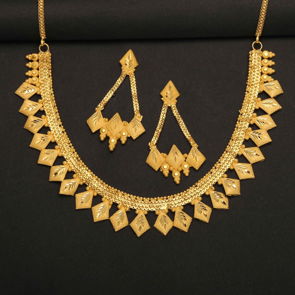 Gold plated necklace with square shaped leaf with ear rings set