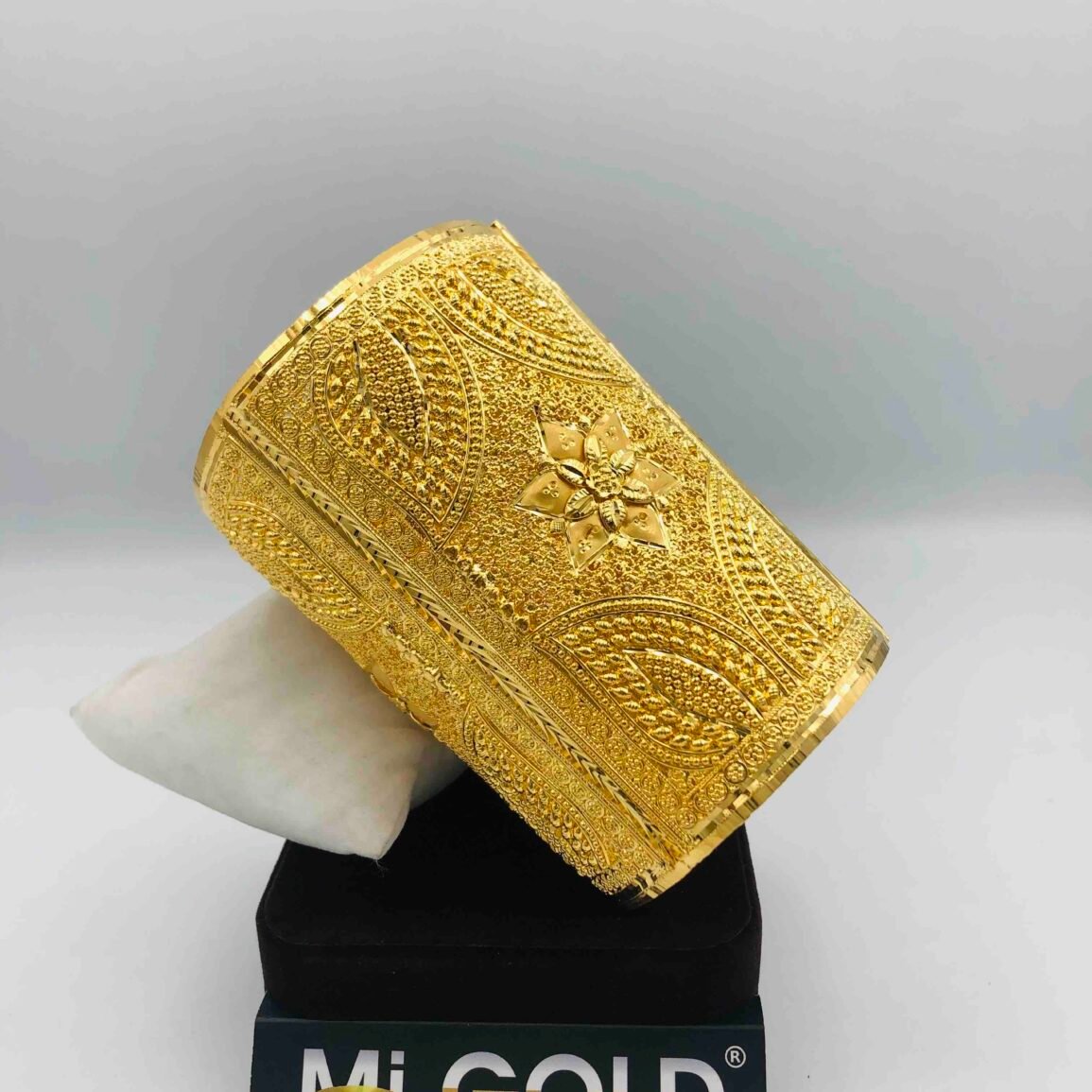Wide Gold-Plated Textured Bangle with Floral Motif