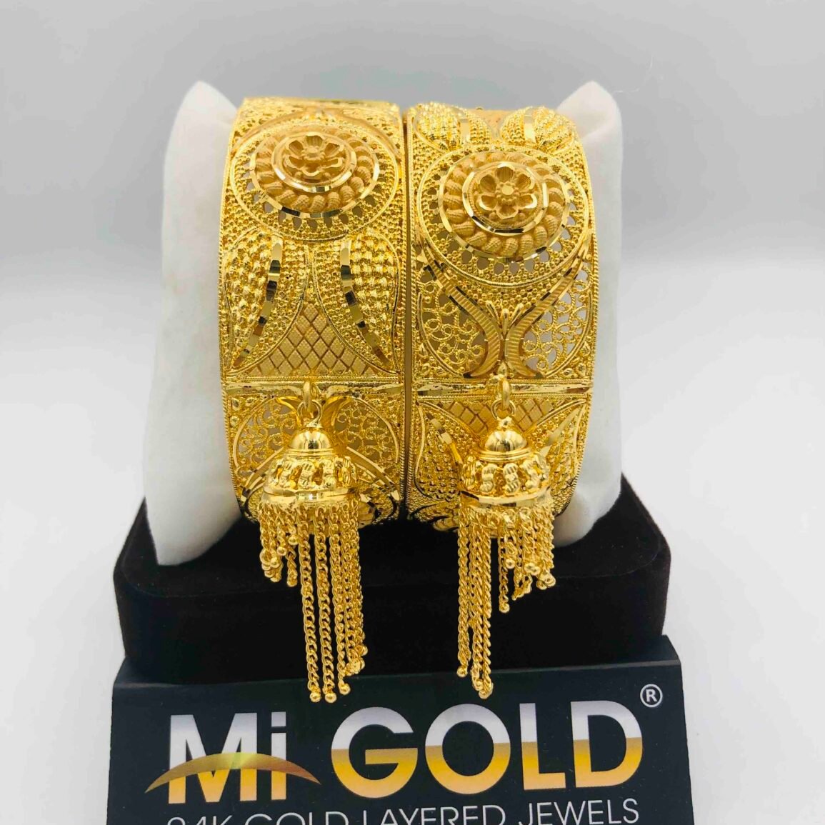 Gold-Tone Filigree Bangles with Tassel Drops